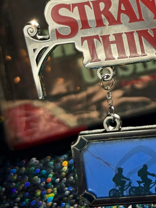 STRANGE SHOP SIGN ENAMEL PIN